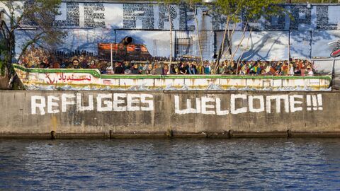 Graffiti eines Flüchtlingsboots