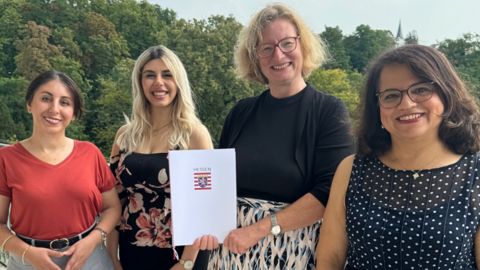 Staatssekretärin Katrin Hechler mit den Projektverantwortlichen von Amal@Work